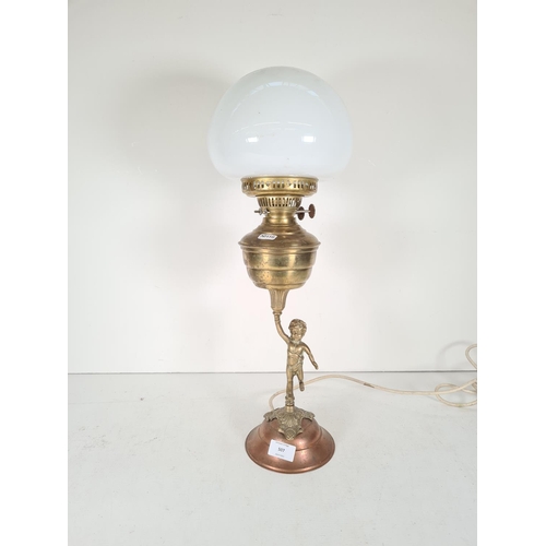 507 - A vintage brass & copper figural table lamp with milk glass shade - approx. 56cm high