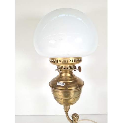 507 - A vintage brass & copper figural table lamp with milk glass shade - approx. 56cm high