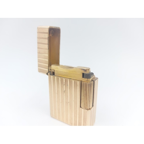 211 - A vintage S. T. Dupont de Paris 20u gold plated cigarette lighter, serial no. J4EY03 - approx. 4.7cm... 