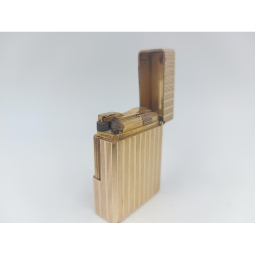 211 - A vintage S. T. Dupont de Paris 20u gold plated cigarette lighter, serial no. J4EY03 - approx. 4.7cm... 