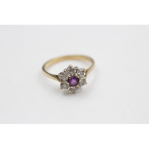 11 - A hallmarked London 9ct gold gemstone cluster dress ring with central amethyst, size N  - approx. gr... 