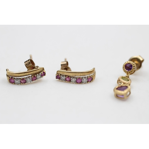 14 - Two pairs of 9ct gold earrings, one pair diamond and ruby half hoop stud earrings and one pair ameth... 