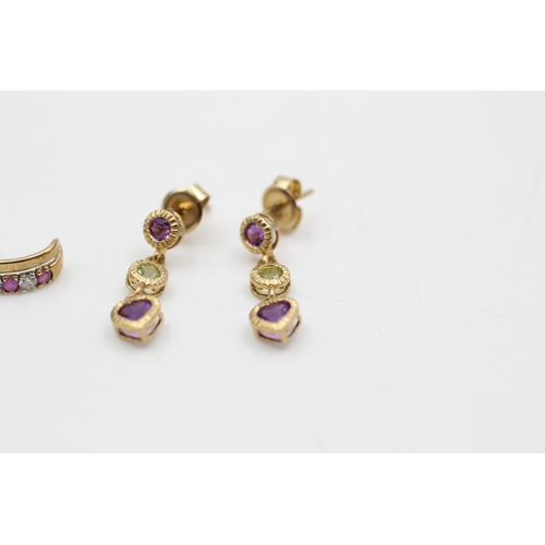 14 - Two pairs of 9ct gold earrings, one pair diamond and ruby half hoop stud earrings and one pair ameth... 