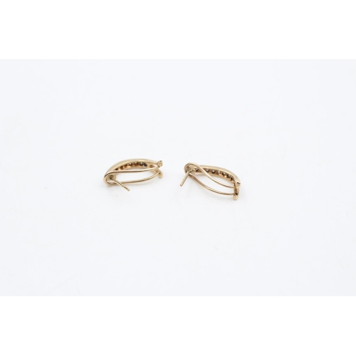 25 - A pair of 9ct gold diamond French back hoop earrings  - approx. gross weight 2.5 grams