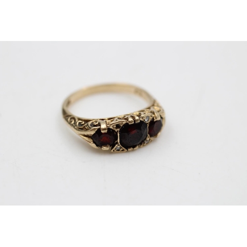 34 - Two 9ct gold dress rings, one garnet and diamond, size L and one with clear stones, size L - approx.... 