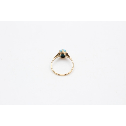 36 - A 9ct gold turquoise effect blue resin solitaire ring, size K ½ - approx. gross weight 1.2 grams