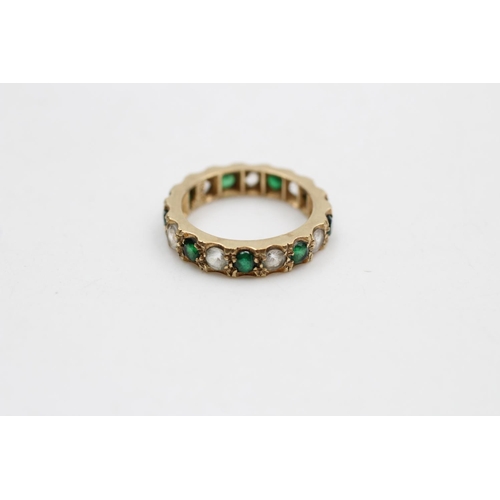 41 - A 9ct gold composite green & clear stones eternity ring, size K ½ - approx. gross weight 3 grams