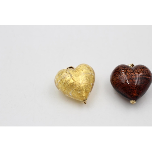 43 - Two 9ct gold bail dichroic glass heart pendants - approx. gross weight 33.4 grams