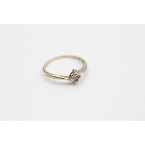 44 - Two 9ct gold diamond tension rings, solitaire size P and three stone size L ½ - approx. gross weight... 