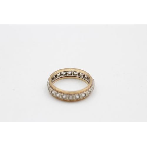 9 - Two 9ct gold and silver eternity rings, one size P and one size M ½ - approx. gross weight 7 grams