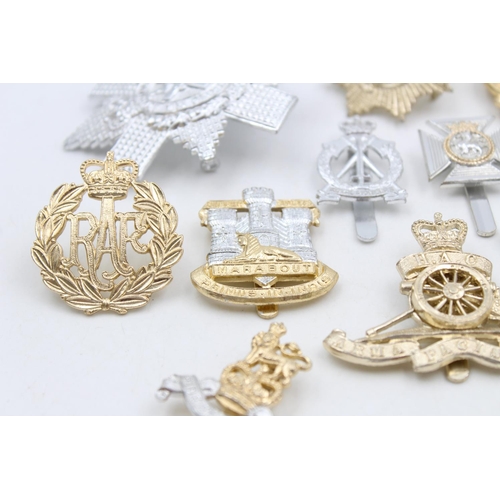 106 - Twelve assorted vintage military Staybrite cap badges to include Scottish, W.R.A.C, Devon & Dorset e... 