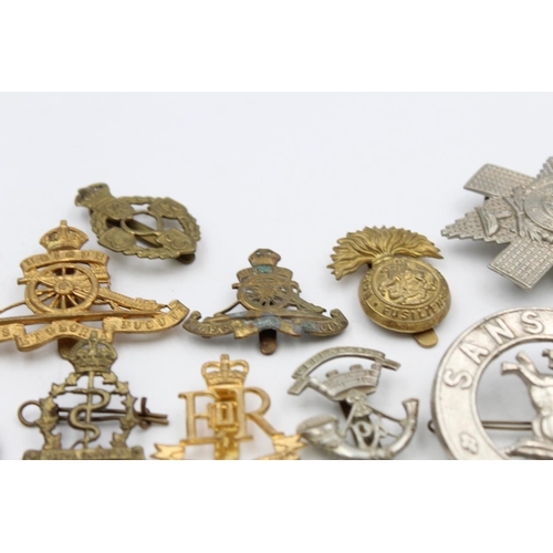 107 - Fifteen assorted vintage military cap badges to include Scottish, A.T.S, Prince Albert's etc.