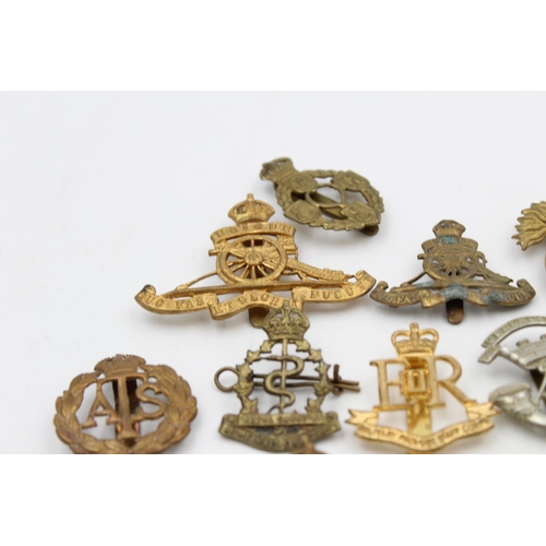 107 - Fifteen assorted vintage military cap badges to include Scottish, A.T.S, Prince Albert's etc.