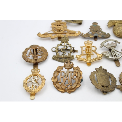 107 - Fifteen assorted vintage military cap badges to include Scottish, A.T.S, Prince Albert's etc.