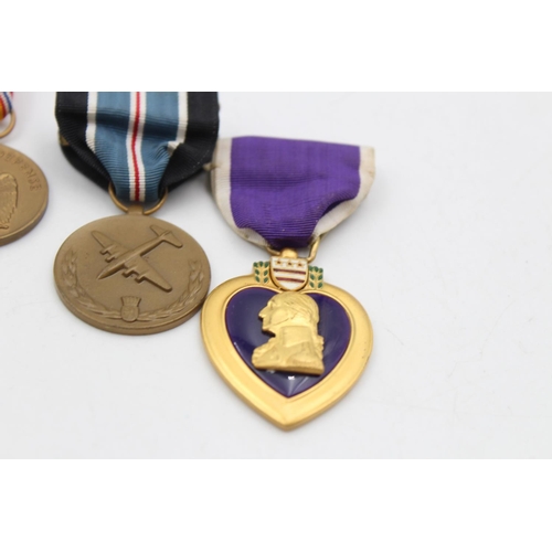 112 - Six assorted vintage American military medals to include Purple Heart, WWII etc.