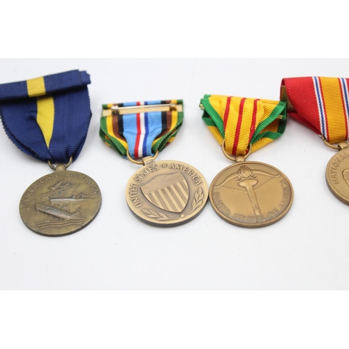 112 - Six assorted vintage American military medals to include Purple Heart, WWII etc.