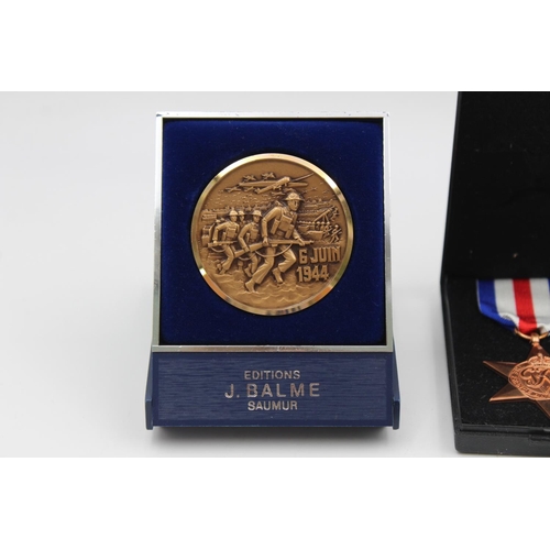 113 - Five various medals to include D-Day Commemorative, The King's Regiment Boxing, The France and Germa... 