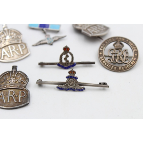 119 - Seven vintage stamped .925 silver military/A.R.P badges to include War badge, no. 77551 - approx. gr... 