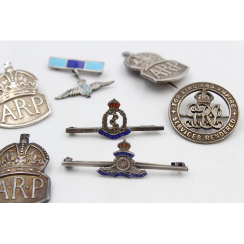 119 - Seven vintage stamped .925 silver military/A.R.P badges to include War badge, no. 77551 - approx. gr... 