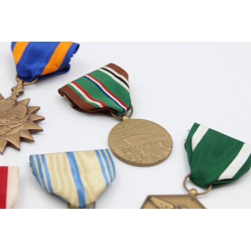 123 - Seven assorted vintage American & Polish military medals to include Medal For Merit, WWII etc.