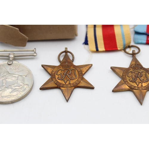 125 - A boxed WWII medal group with award note and packets to include The Africa Star, War Medal 1939-1945... 