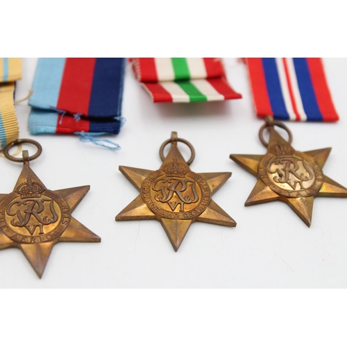 125 - A boxed WWII medal group with award note and packets to include The Africa Star, War Medal 1939-1945... 