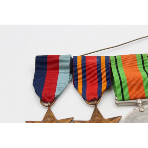 126 - Four WWII mounted medals awarded to Capt. G. C. Cooke to include The Defence Medal, The Burma Star, ... 