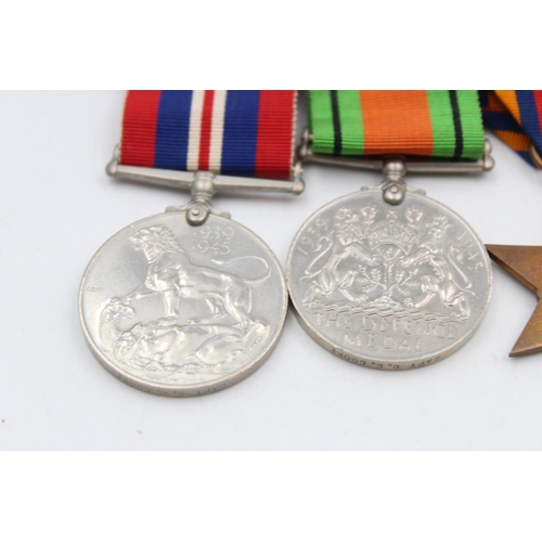 126 - Four WWII mounted medals awarded to Capt. G. C. Cooke to include The Defence Medal, The Burma Star, ... 