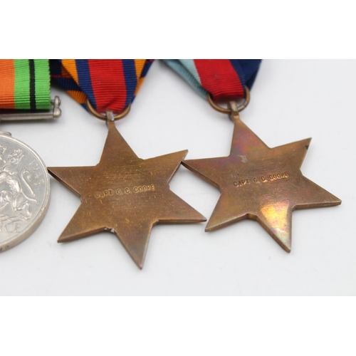 126 - Four WWII mounted medals awarded to Capt. G. C. Cooke to include The Defence Medal, The Burma Star, ... 