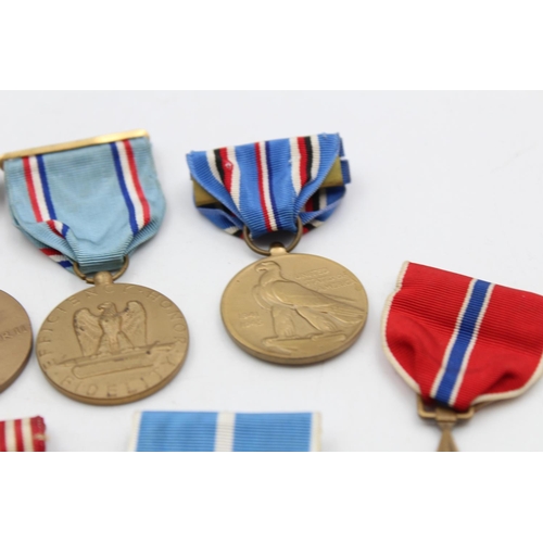 130 - Seven assorted vintage American military medals to include WWII, Bronze Star etc.