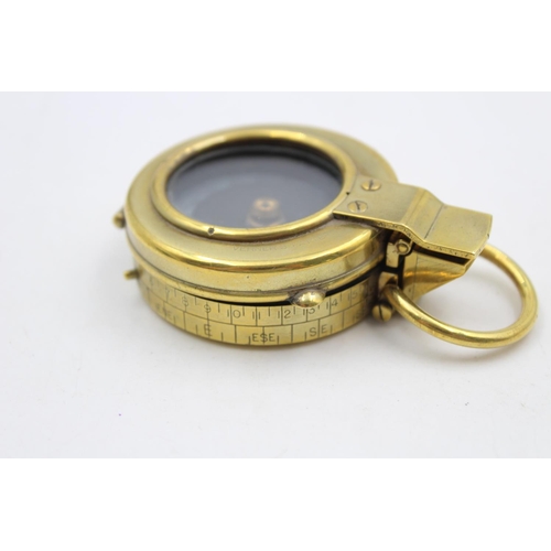 143 - A WWI British brass military compass with makers mark F-L, numbered 112031 and dated 1917 - approx. ... 