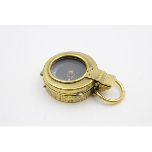 143 - A WWI British brass military compass with makers mark F-L, numbered 112031 and dated 1917 - approx. ... 