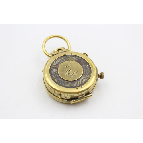 143 - A WWI British brass military compass with makers mark F-L, numbered 112031 and dated 1917 - approx. ... 