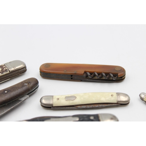 152 - Twelve assorted vintage pocket knives to include multi-tool, mother of pearl handled etc.