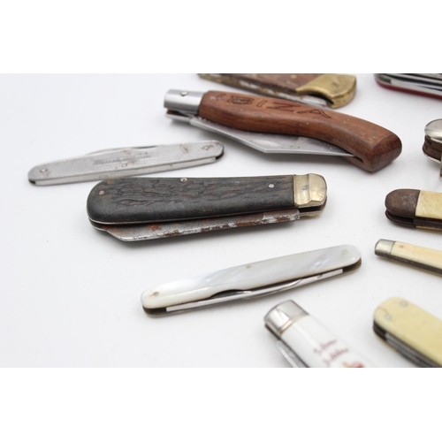 153 - Twelve assorted vintage pocket knives to include Swiss army etc.