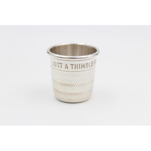 165 - A hallmarked Birmingham silver 4cm Just A Thimble shot cup by Mappin & Webb, dated 1983 - approx. gr... 