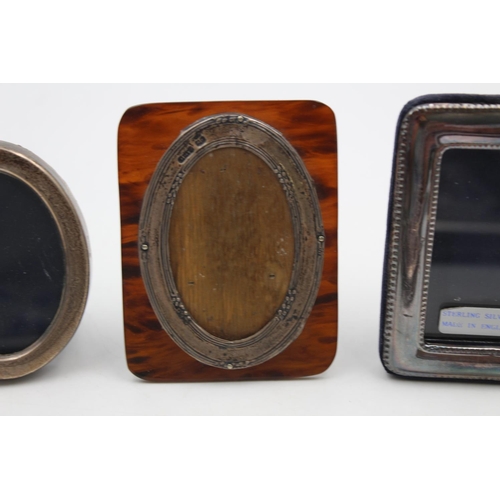 174 - Three hallmarked silver photograph frames - approx. combined gross weight 119 grams