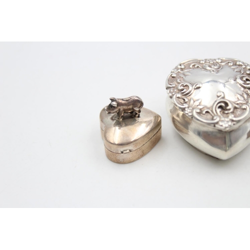 176 - Three sterling silver heart shaped pill/trinket boxes, two being hallmarked and one stamped .925 - a... 