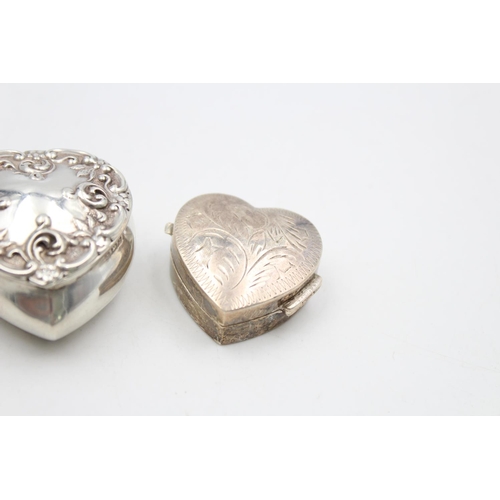 176 - Three sterling silver heart shaped pill/trinket boxes, two being hallmarked and one stamped .925 - a... 