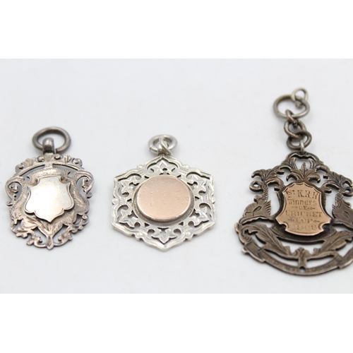 177 - Three hallmarked silver fobs/medallions - approx. combined gross weight 35 grams