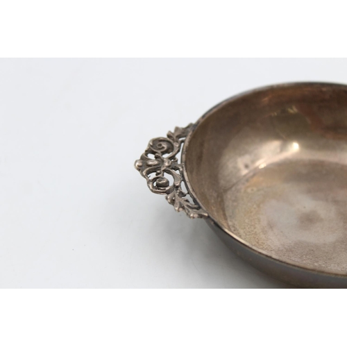 201 - A stamped .900 silver 12.5cm twin handled bowl - approx. gross weight 45 grams