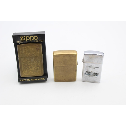 212 - Three assorted Zippo cigarette lighters