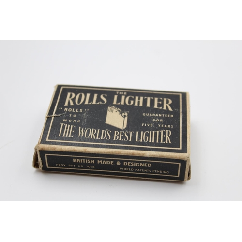 214 - A vintage Rolls cigarette lighter with original box