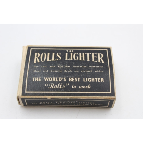 214 - A vintage Rolls cigarette lighter with original box