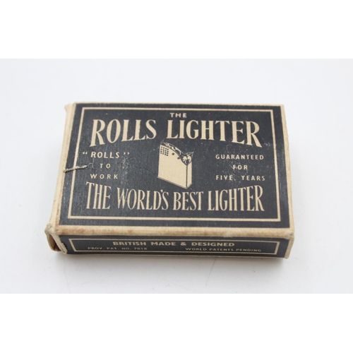 214 - A vintage Rolls cigarette lighter with original box