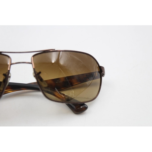 218 - A pair of cased classic Ray-Ban brown oversized rectangular gents sunglasses