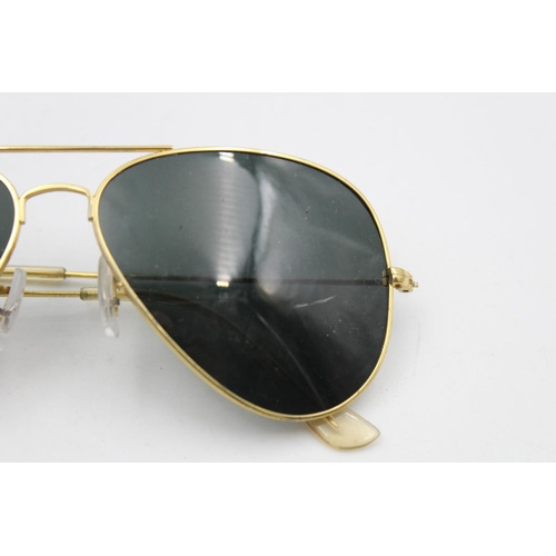 220 - A pair of classic Ray-Ban Aviator gold tone gents sunglasses with original case