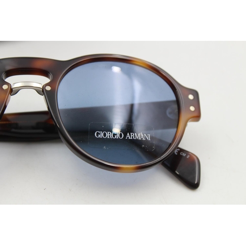 225 - A pair of cased classic Giorgio Armani tortoiseshell effect gents sunglasses