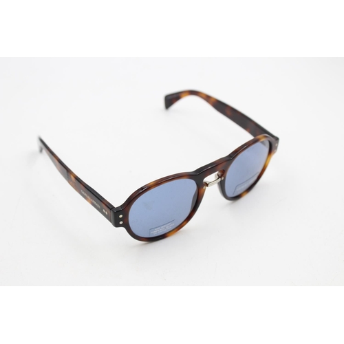 225 - A pair of cased classic Giorgio Armani tortoiseshell effect gents sunglasses