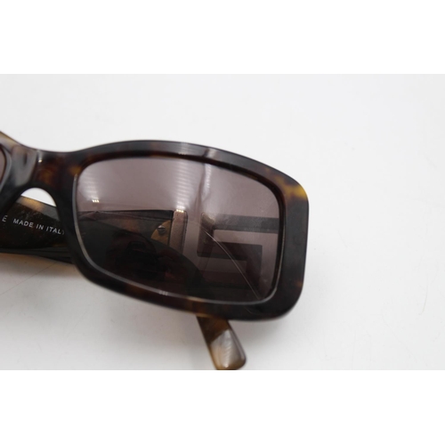 228 - A pair of cased Versace tortoiseshell rectangular framed ladies sunglasses